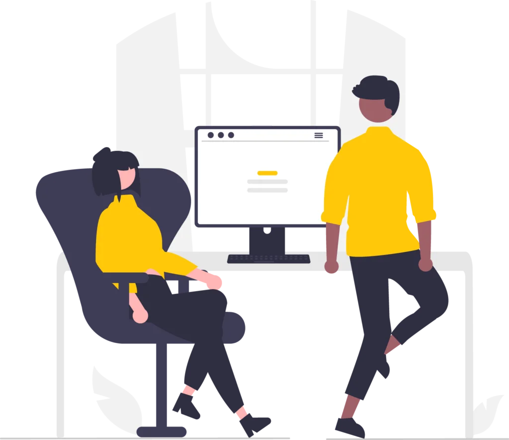 Two-people-interacting-with-computer,-one-sitting-and-one-standing