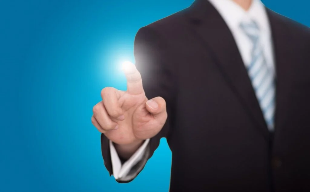 How to Choose the Best SEO Agency for Your Shopify Store blurred businessman with bright finger 1112 275