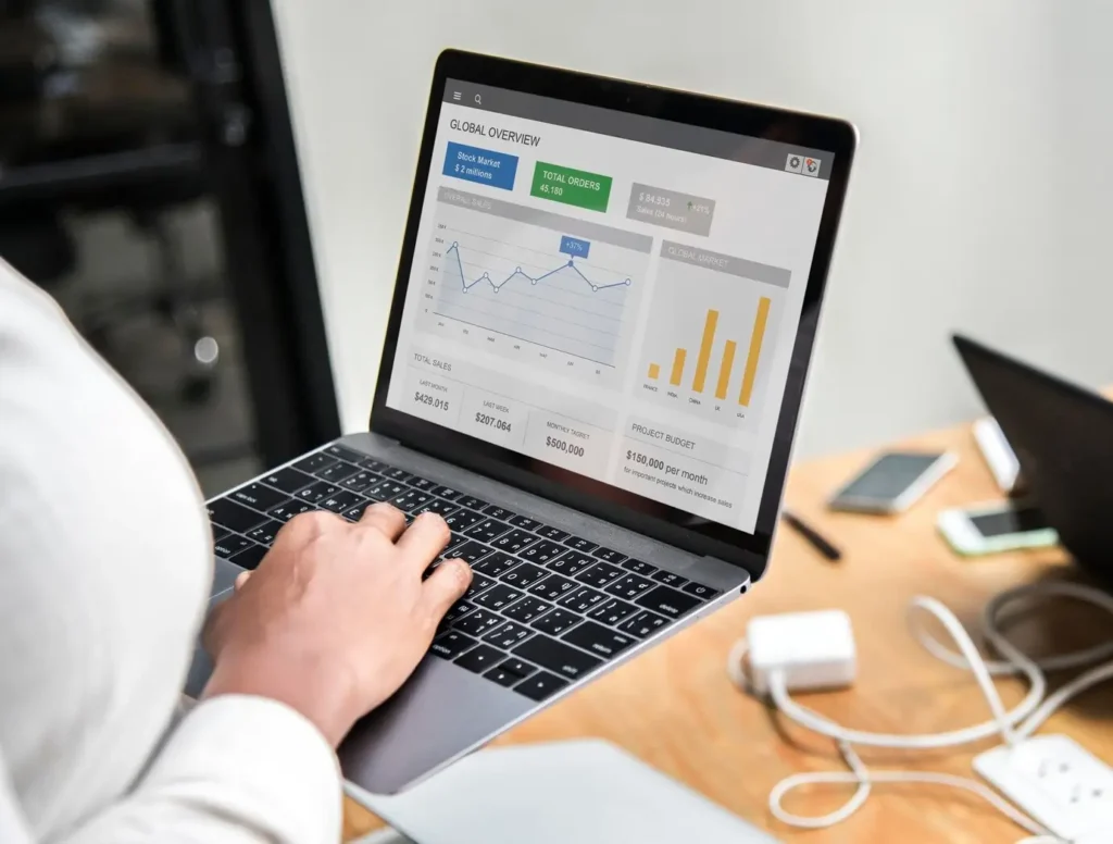 Case Study: Boosting SEO for a Global Travel Company with High-Quality Link Building 37 person-using-laptop-to-view-SEO-reports-and-graphs