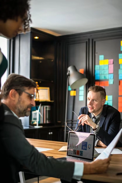 SEO-team-discussing-technical-seo-and-business-strategy-in-office-meeting