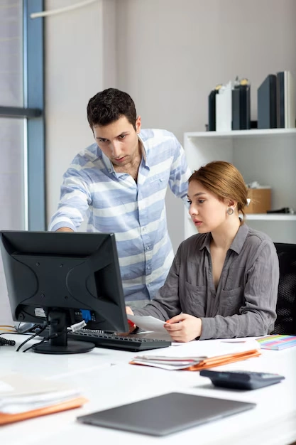 Digital Marketing Agency in Australia: The Key to Overcoming Your Business Struggles 20 team-working-on-link-acquisition-strategy-at-office-desk