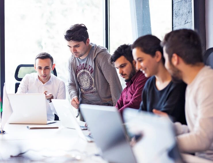On-page SEO team collaborating on keyword targeting techniques and optimization strategies