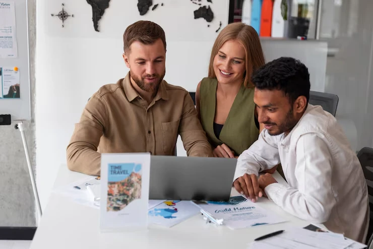 SEO penalty recovery team analyzing website data and developing restoration strategy on laptop