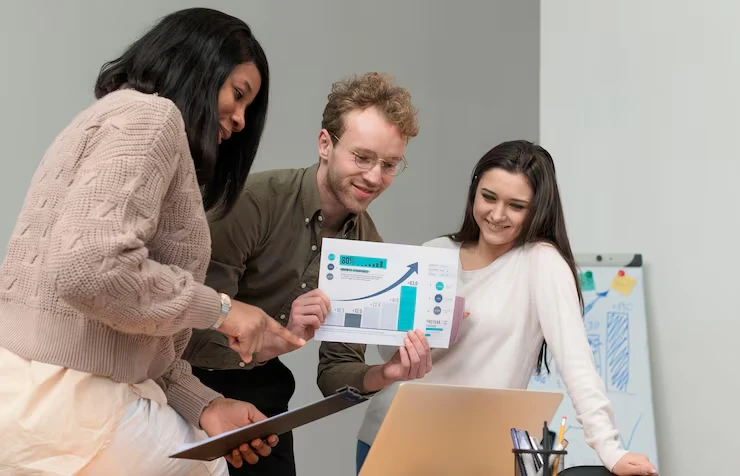 SEO team analyzing strategy charts and data for effective search optimization implementation