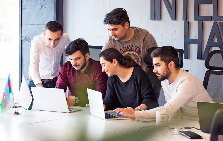 Digital marketing team collaborating on strategic link building campaign for website authority enhancement
