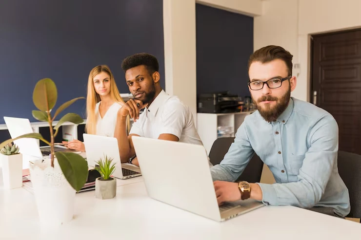 eCommerce SEO for German markets team working on laptops optimizing online store strategies